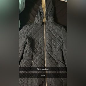 Size medium coat with white fur on the inside